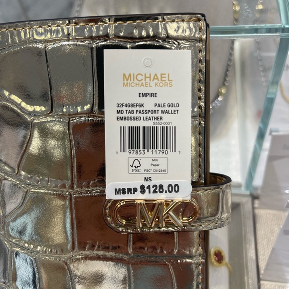 Michael Kors Empire Metallic Crocodile Embossed Leather Passport Wallet
Pale Gld - Picture 3 of 16